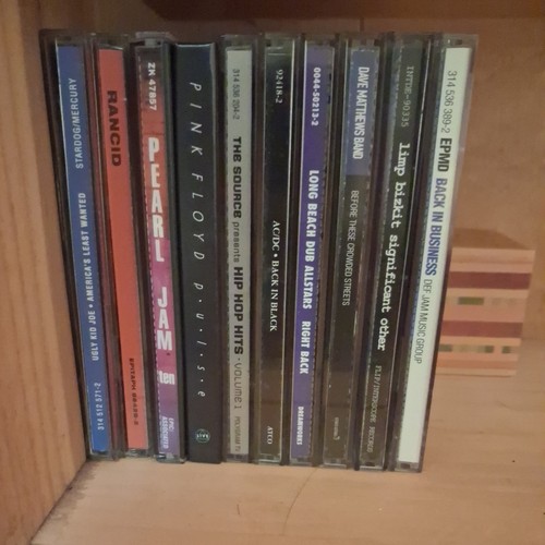 Assorted empty album cases - cd,